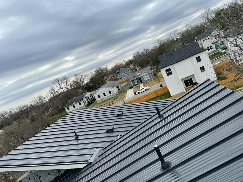 Standing seam metal roof panels with vents for Skylight Repair in Ridgefield